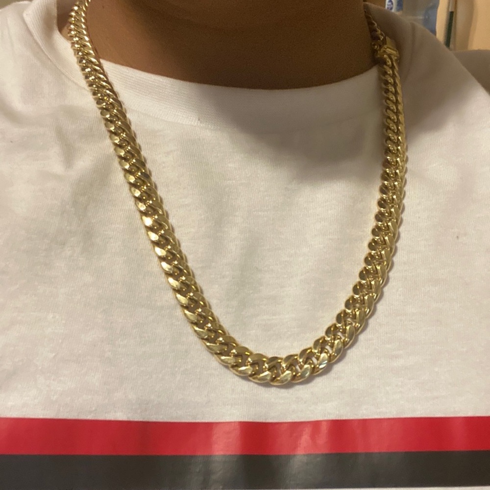 Cuban chain link and bracelet 81.4 both   61.4 the chain and 20. The bracelet